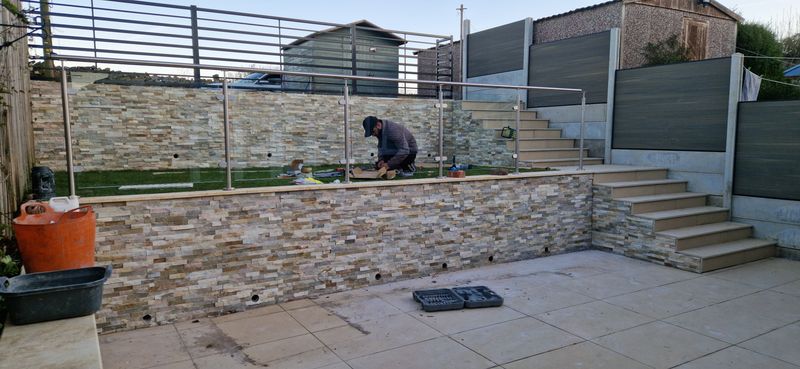 Landscaping driveway and back garden for disabled stair lift access
