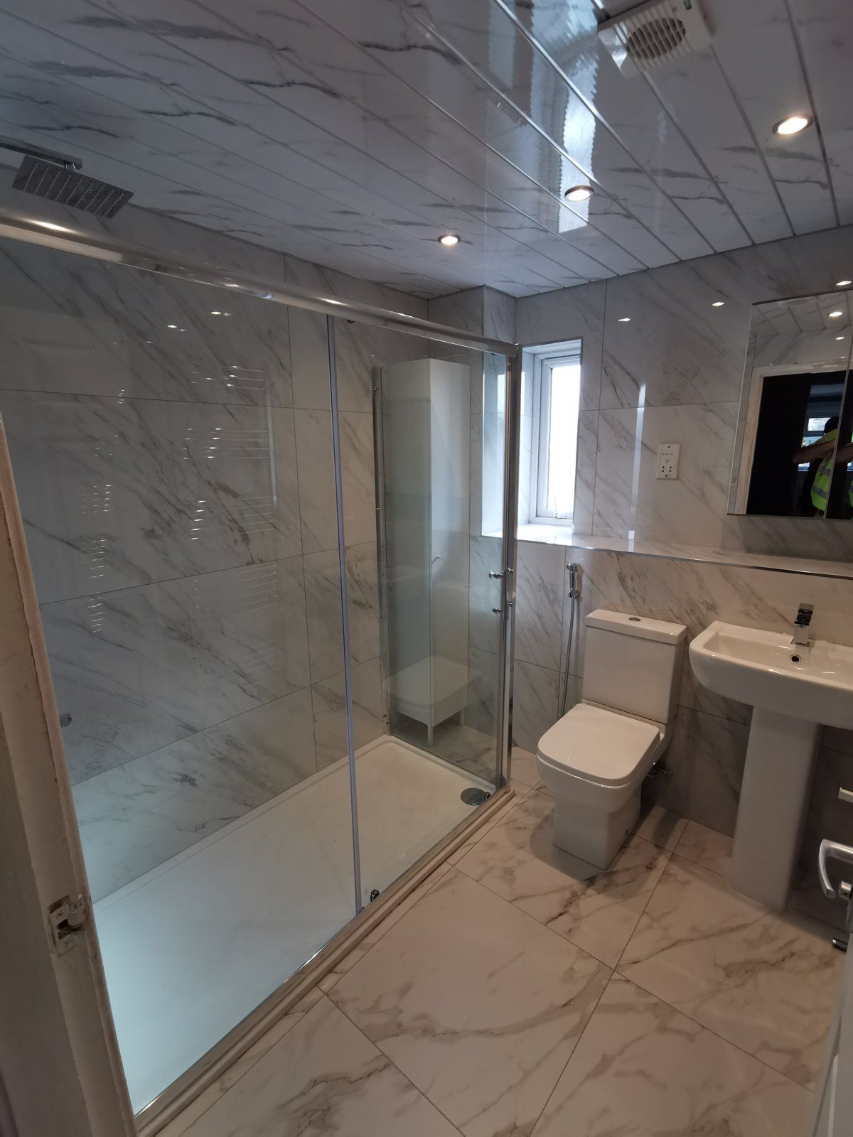 Marble bathroom with walk-in rainfall shower - main photo